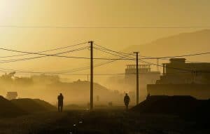 silhouette of person standing on hill during daytime in Afghanastan