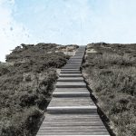 Navigating Grief and Loss with God’s Comfort and Hope: A Resource for Christian Counseling. a wooden stairs going up a hill